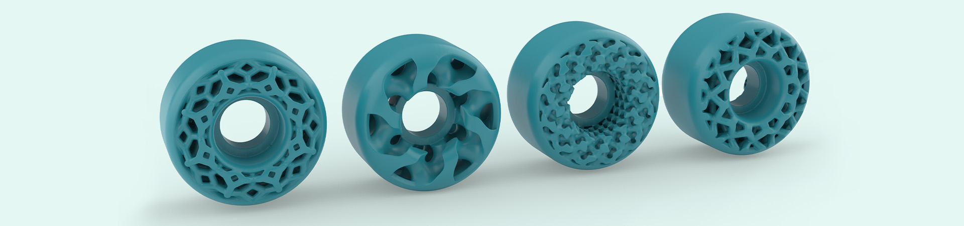 Render of blue skateboard wheels designed for the additive manufacturing process with various complex lattice structures included.
