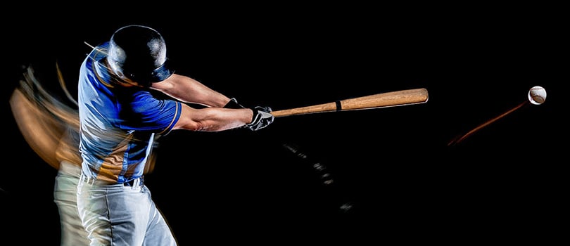 Sports simulation demonstrates the impact of the ball hitting the baseball player's bat.