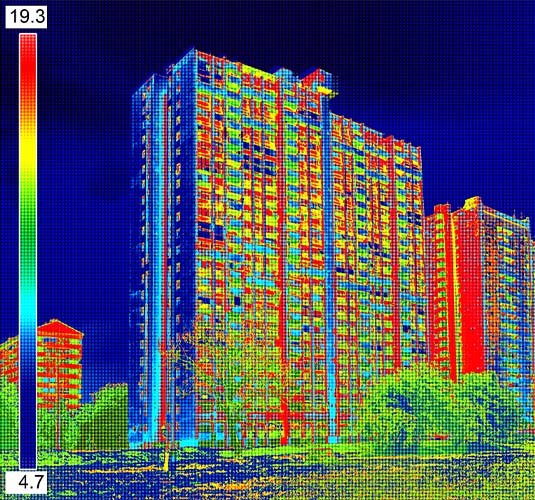 Infrared image showing thermal insulation of a residential building.