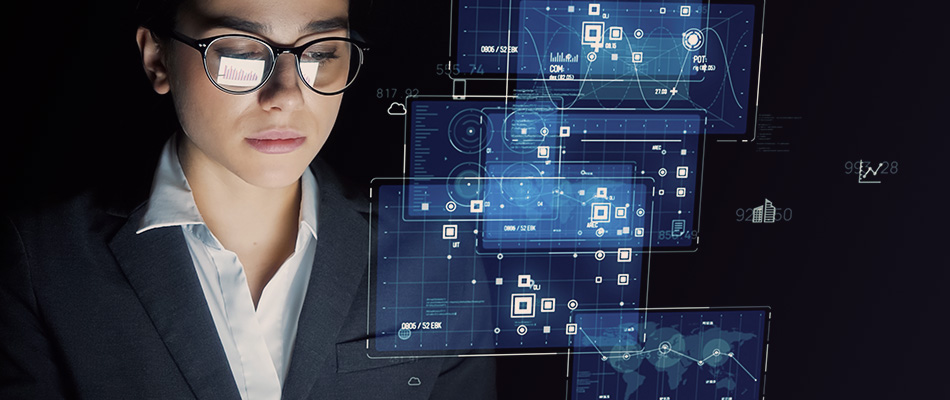 Data analytics professional looking down, with futuristic floating technology illustrations.