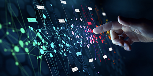 Hand with finger reaching toward colorful, connected nodes or data points.