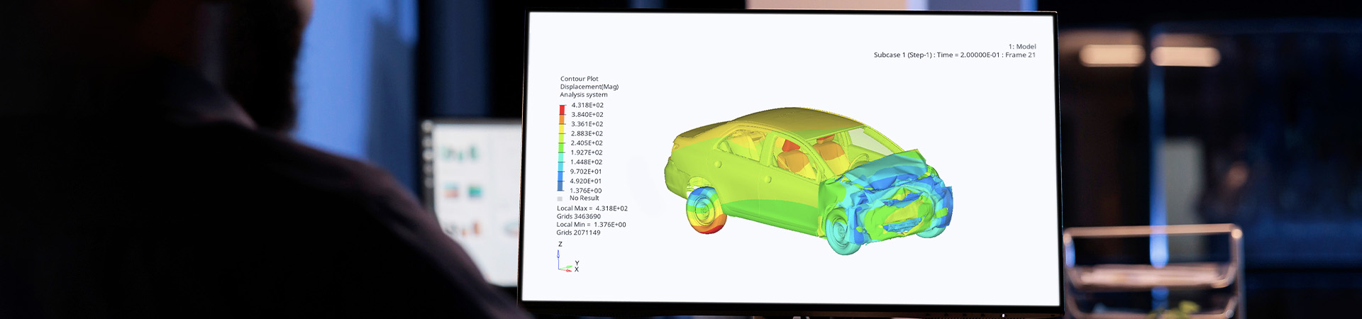 An engineer uses OptiStruct explicit structural analysis software to assess a car crash.